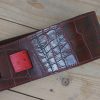 Art guitar strap in red and brown leather